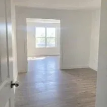 Vacant apartment unit freshly painted white for a rental turnover