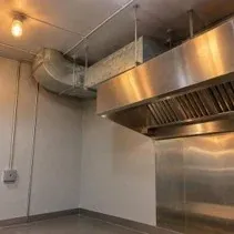 Restaurant kitchen repainted grey with a painted ceiling