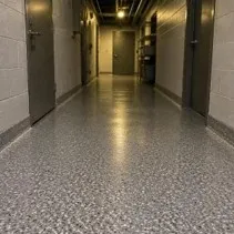 Flake epoxy corridor floor Flake epoxy floor coating in a commercial service corridor