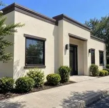 Office building stucco repaint Office building stucco exterior repainted cream