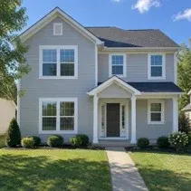 House in Kelowna repainted light grey with white trim