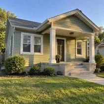 Bungalow siding and porch repainted sage green