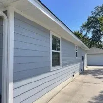 Soffits, fascia and siding newly painted on a Kelowna home