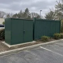 Utility box and fence repainted over graffiti on a Kelowna property