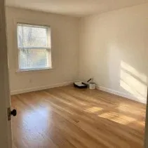 Living room repainted warm white with eco-friendly matte paint