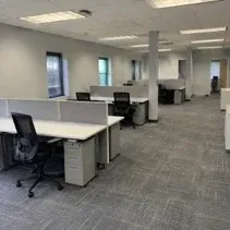 Open-plan office painting Open-plan office in Kelowna repainted light grey throughout