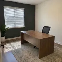 Office accent wall painting Private office painted white with a dark accent wall