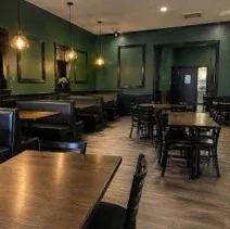 Restaurant dining room repaint Restaurant dining room in Kelowna repainted deep green
