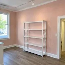 Boutique feature wall painting Boutique shop feature wall repainted blush pink
