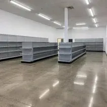 Retail store interior painting Empty retail store interior repainted white before fit-out in Kelowna