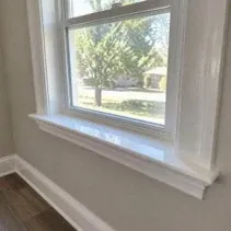 Window trim repaint Window trim and sill repainted glossy white
